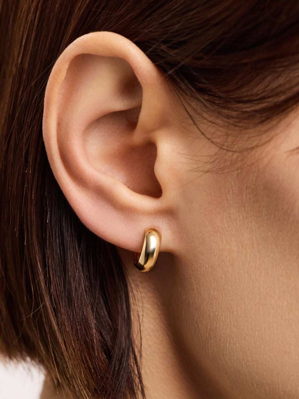 18K gold-plated - Gold Bold Huggie Hoops by MAVERA