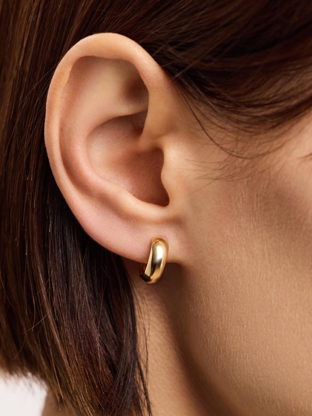 18K gold-plated - Gold Bold Huggie Hoops by MAVERA