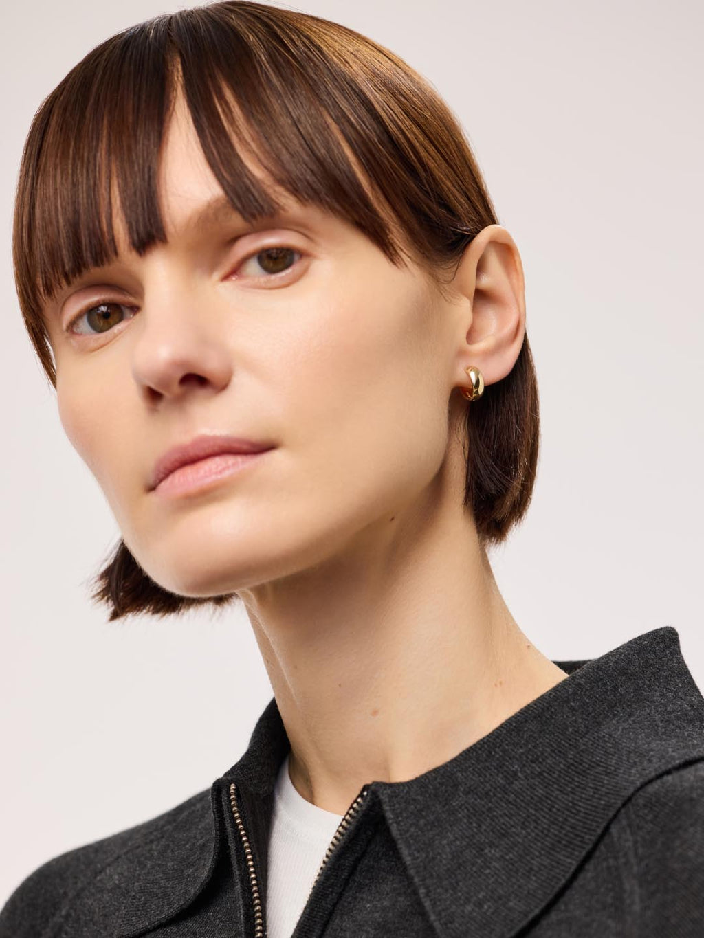 18K gold-plated - Gold Bold Huggie Hoops by MAVERA
