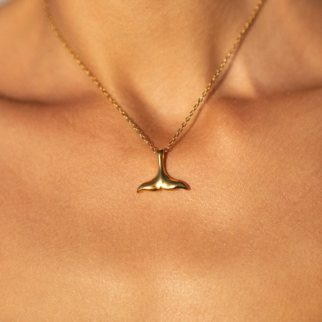 whale-tail-necklace-on-model